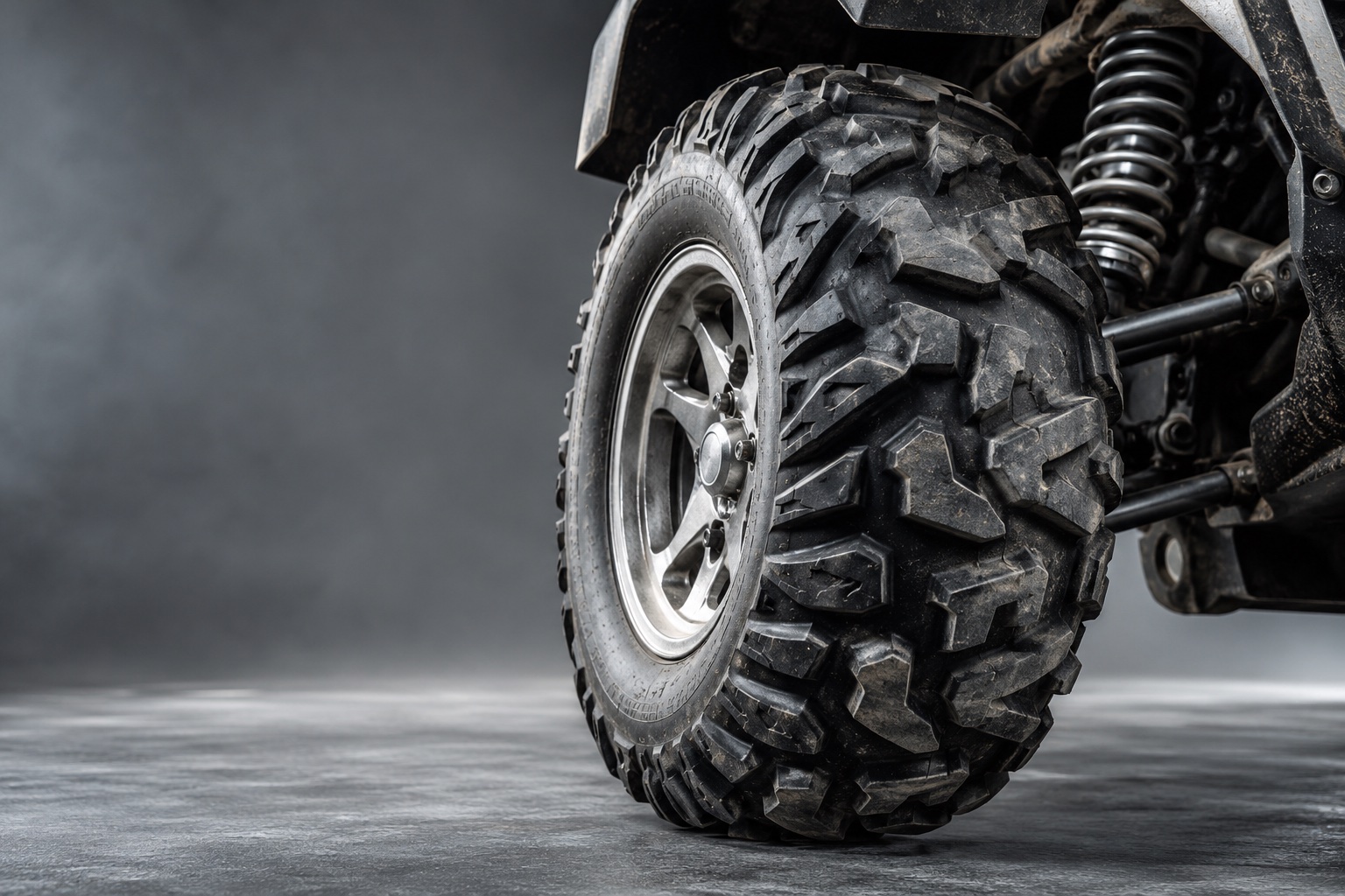 Illustrative AI study of an ATV tire and suspension; not CNR equipment or work